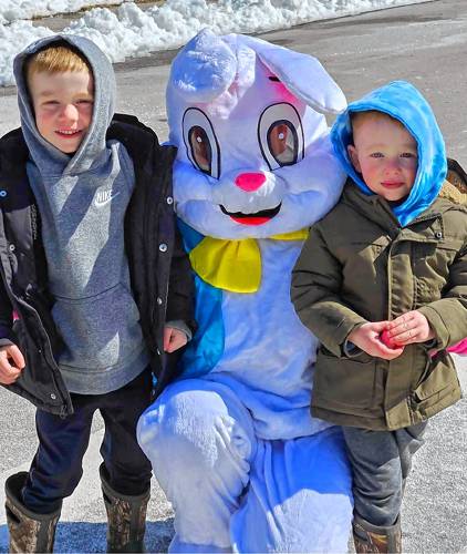 Bob and Jack Molloy get a photo with the Easter Bunny.