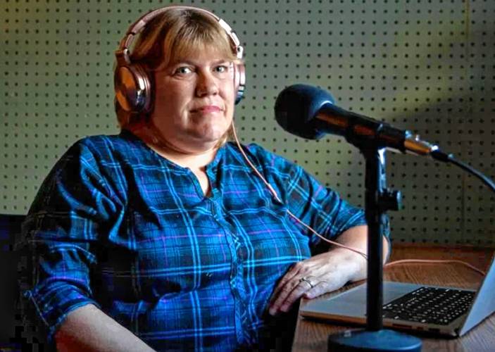 Jane Boroski, the sole survivor of the Connecticut River Valley Killer, sits in front of her microphone as she tells her story on “Dark Valley.”
