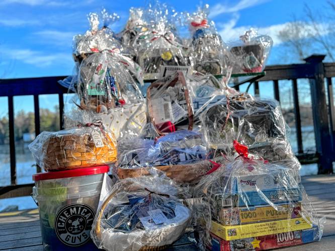 Gift baskets are among the auction items.