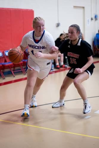 Ella Pearson drives to the hoop.