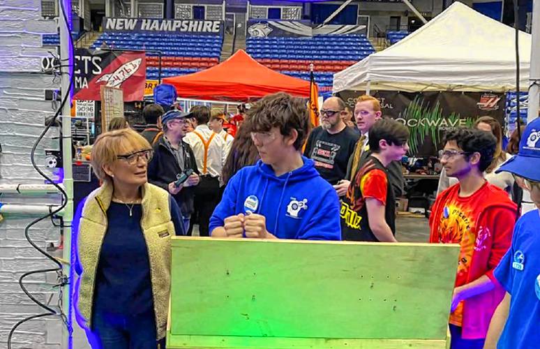 U.S. Sen. Maggie Hassan, left, chats with Team Inconceivable’s Kade Fletcher during the regional competition at UNH on March 30. 