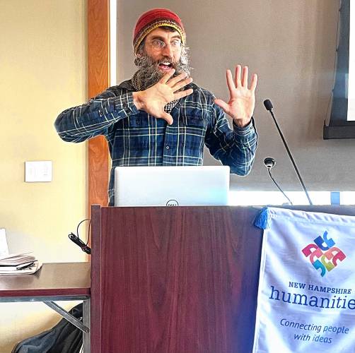 New Hampshire Humanities presenter Marek Bennett spoke about the art of graphic storytelling on Saturday at the Peterborough Town Library. 