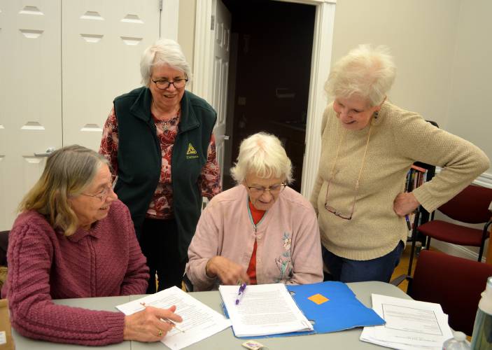 From left, Nikki Andrews, Linda Kepner, Jessie Salisbury and Stasia Millett during a Talespinners meeting at J. A. Tarbell Library in Lyndeborough.