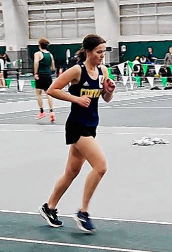 Sara Mackie competes in the girls’ 1,500-meter run.
